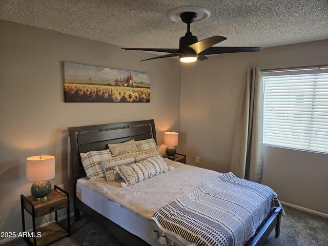 461 W Holmes Ave Unit 360, Mesa, AZ 85210 - carpeted bedroom featuring baseboards, a textured ceiling, and a ceiling fan