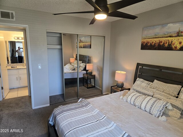 461 W Holmes Ave Unit 360, Mesa, AZ 85210 - bedroom with carpet floors, a closet, and a ceiling fan