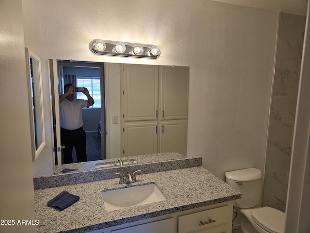461 W Holmes Ave Unit 360, Mesa, AZ 85210 - bathroom featuring vanity and toilet
