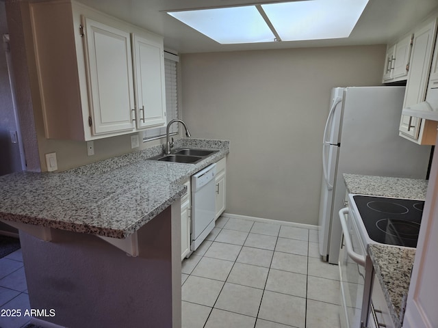 461 W Holmes Ave Unit 360, Mesa, AZ 85210 - kitchen with a sink, white appliances, light tile patterned floors, and white cabinetry