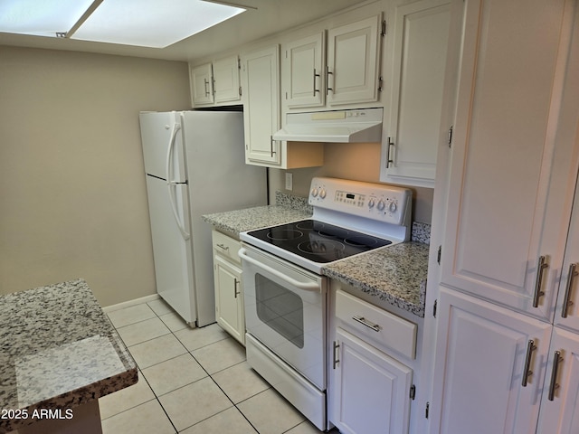 461 W Holmes Ave Unit 360, Mesa, AZ 85210 - kitchen featuring white appliances, under cabinet range hood, light tile patterned flooring, and white cabinetry