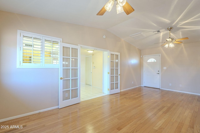 1530 E Loma Ln, Phoenix, AZ 85020 - unfurnished room featuring a ceiling fan, french doors, light wood-style floors, and lofted ceiling