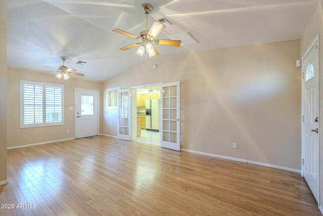 1530 E Loma Ln, Phoenix, AZ 85020 - entryway featuring french doors, light wood-type flooring, a ceiling fan, and vaulted ceiling