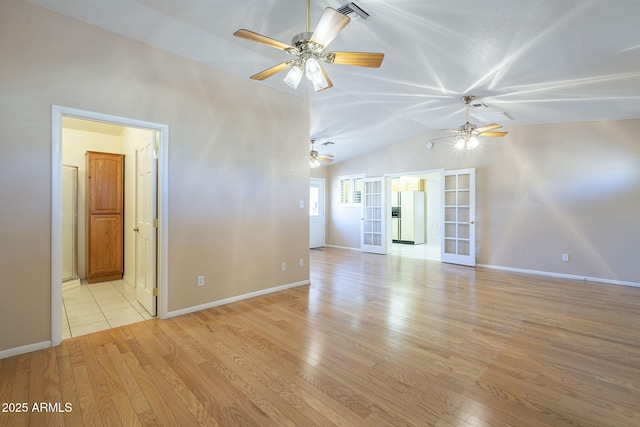 1530 E Loma Ln, Phoenix, AZ 85020 - unfurnished room featuring french doors, light wood-type flooring, lofted ceiling, and ceiling fan