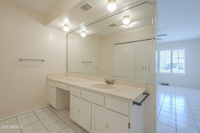 1530 E Loma Ln, Phoenix, AZ 85020 - bathroom with tile patterned flooring and vanity