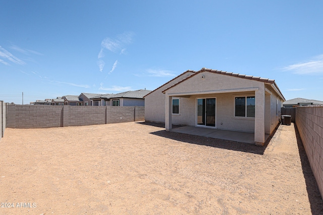 rear view of property with a patio