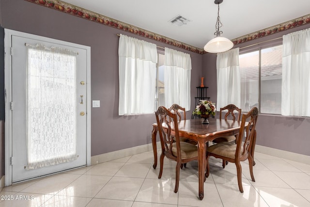 view of tiled dining space