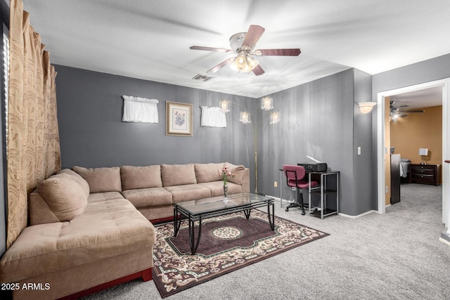 living room with light carpet and ceiling fan