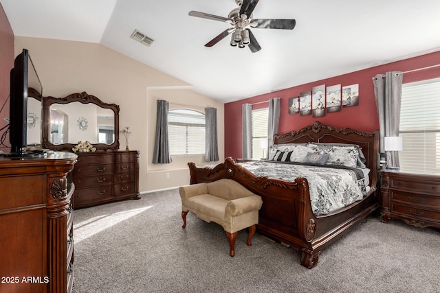 bedroom featuring ceiling fan, lofted ceiling, and carpet flooring