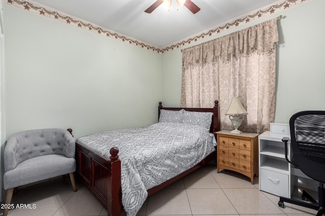 tiled bedroom featuring ceiling fan