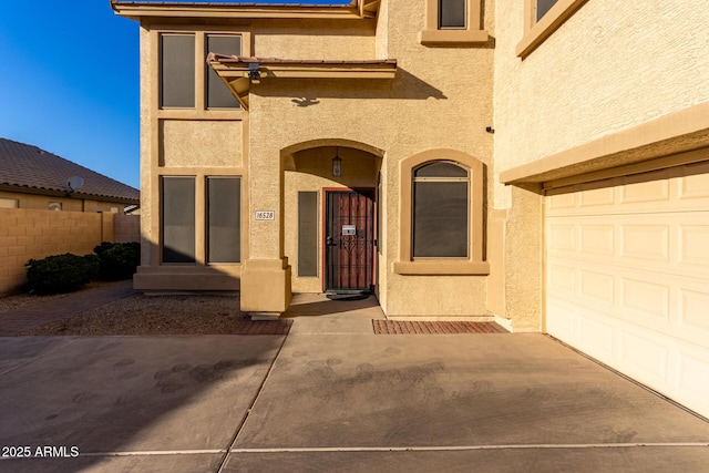 doorway to property featuring a patio area