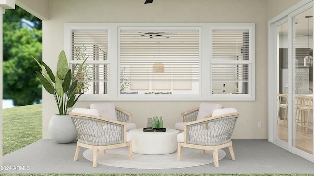 sunroom / solarium with ceiling fan