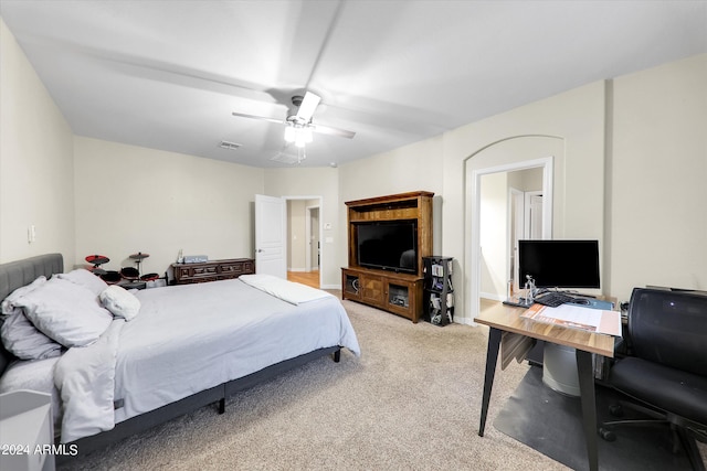 carpeted bedroom with ceiling fan