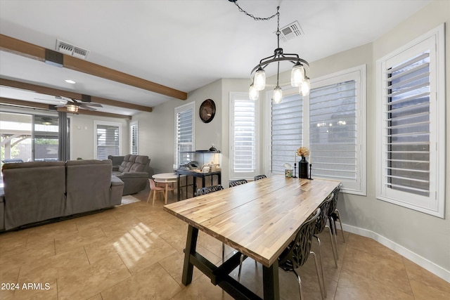 tiled dining area with ceiling fan and beam ceiling