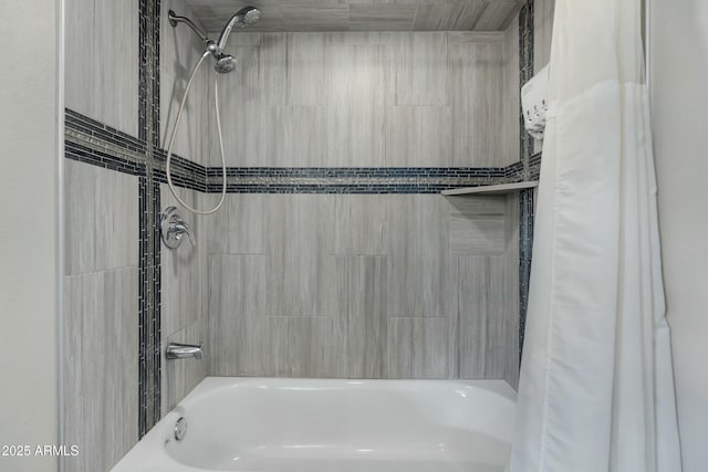 bathroom with shower / tub combo with curtain