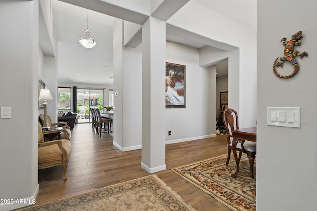 19023 E Buckskin Ct, Rio Verde, AZ 85263 - hallway with a high ceiling, baseboards, and wood finished floors