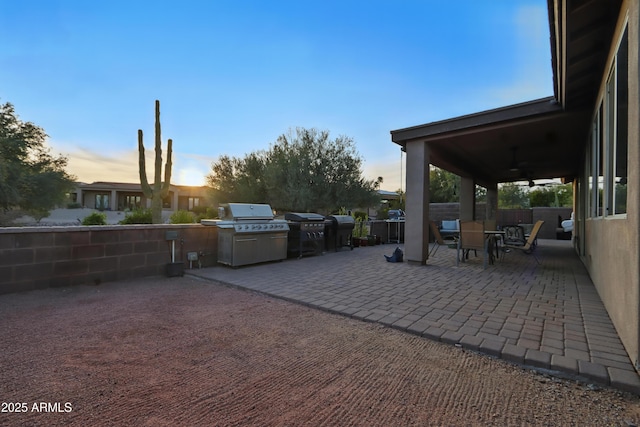 19023 E Buckskin Ct, Rio Verde, AZ 85263 - view of patio with a grill, outdoor dining area, fence, and ceiling fan