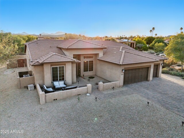 19023 E Buckskin Ct, Rio Verde, AZ 85263 - view of front of home featuring a tile roof, decorative driveway, a garage, and stucco siding