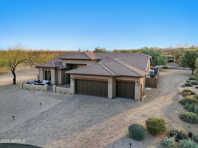 19023 E Buckskin Ct, Rio Verde, AZ 85263 - view of front of house with a tiled roof, decorative driveway, stucco siding, and an attached garage
