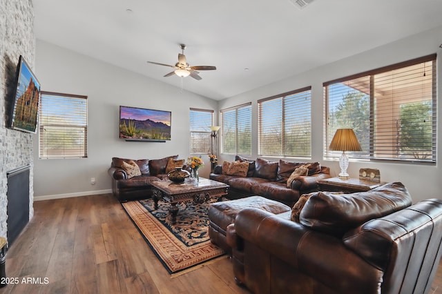 19023 E Buckskin Ct, Rio Verde, AZ 85263 - living area with lofted ceiling, plenty of natural light, a ceiling fan, and hardwood / wood-style flooring