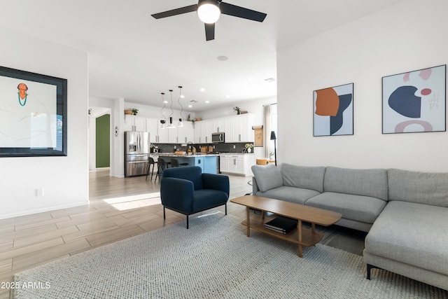 1492 W Bruce Ave, Gilbert, AZ 85233 - living room with ceiling fan, light wood-style flooring, and recessed lighting