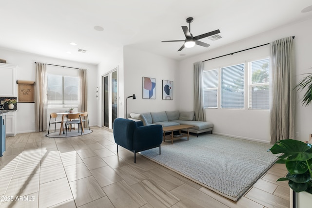 1492 W Bruce Ave, Gilbert, AZ 85233 - living room featuring ceiling fan and recessed lighting