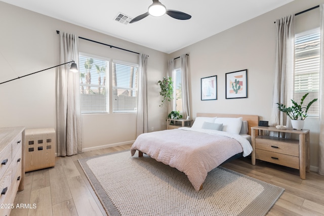 1492 W Bruce Ave, Gilbert, AZ 85233 - bedroom featuring light wood-style flooring and a ceiling fan