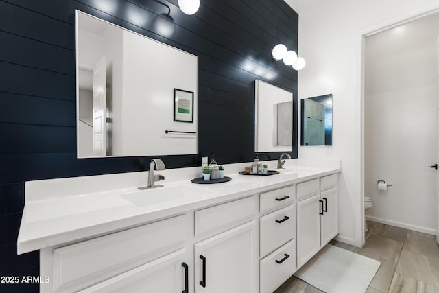 1492 W Bruce Ave, Gilbert, AZ 85233 - bathroom featuring double vanity and wood walls