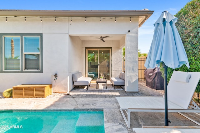 1492 W Bruce Ave, Gilbert, AZ 85233 - back of property featuring a patio, an outdoor hangout area, a ceiling fan, and stucco siding