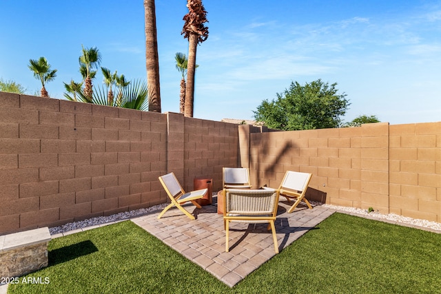 1492 W Bruce Ave, Gilbert, AZ 85233 - fenced backyard with a patio