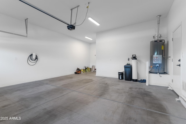 1492 W Bruce Ave, Gilbert, AZ 85233 - garage with gas water heater and a garage door opener
