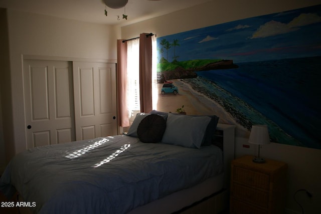 bedroom featuring a closet and multiple windows