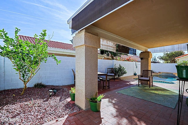 view of patio with a fenced backyard and a fenced in pool