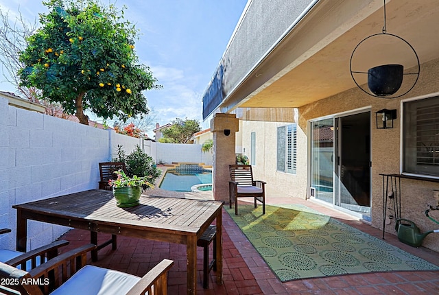 view of patio featuring a fenced backyard and a fenced in pool