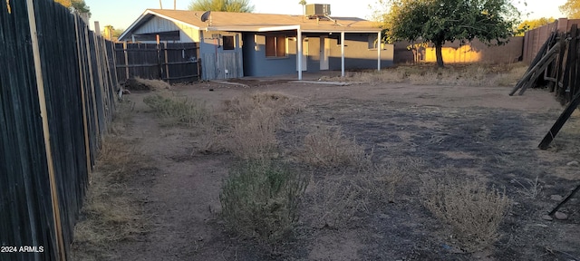 view of yard with central AC