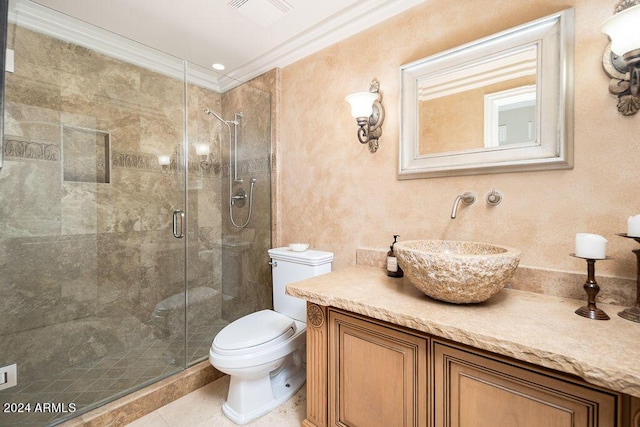 bathroom with toilet, tile patterned floors, walk in shower, ornamental molding, and vanity