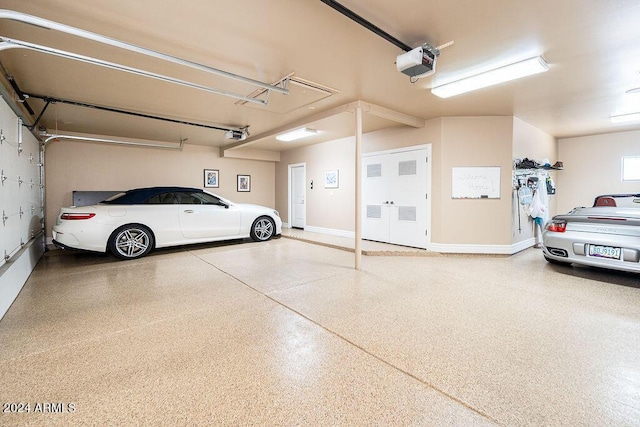 garage featuring a garage door opener