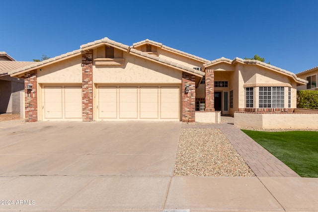 view of front of property featuring a garage