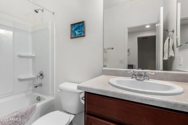 full bathroom with shower / bathing tub combination, vanity, and toilet