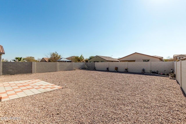 view of yard with a patio area