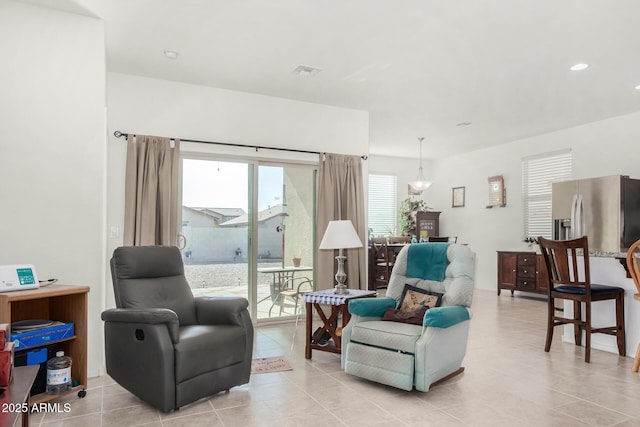 sitting room with light tile patterned floors