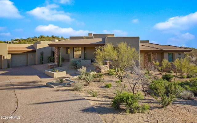 view of front of property featuring a garage