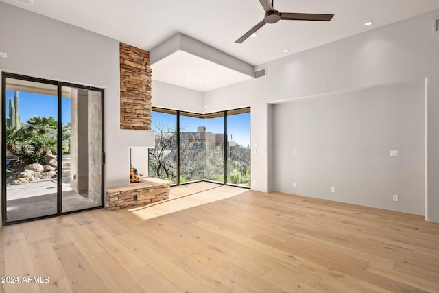 spare room with ceiling fan and light hardwood / wood-style floors