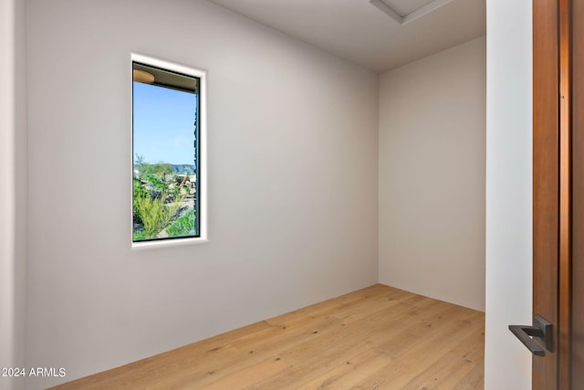 spare room featuring light hardwood / wood-style floors