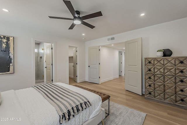 5028 W Shangri La Rd, Glendale, AZ 85304 - bedroom featuring light wood-type flooring, recessed lighting, ensuite bath, and ceiling fan