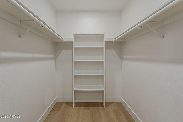 5028 W Shangri La Rd, Glendale, AZ 85304 - walk in closet with wood finished floors