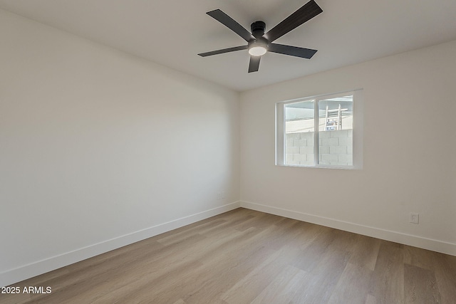 5028 W Shangri La Rd, Glendale, AZ 85304 - empty room featuring light wood-style flooring and ceiling fan
