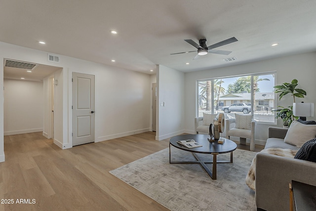 5028 W Shangri La Rd, Glendale, AZ 85304 - living room featuring light wood-style flooring, ceiling fan, and recessed lighting