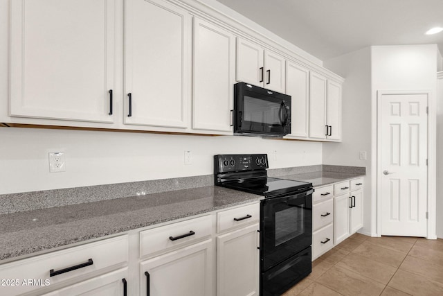 kitchen with stone counters, recessed lighting, light tile patterned floors, white cabinets, and black appliances