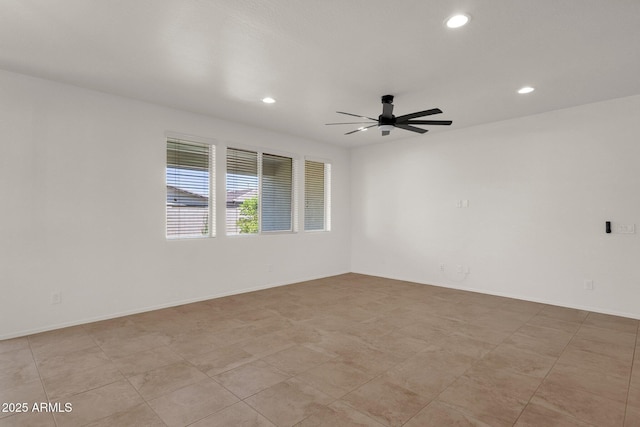 spare room featuring baseboards, recessed lighting, and a ceiling fan